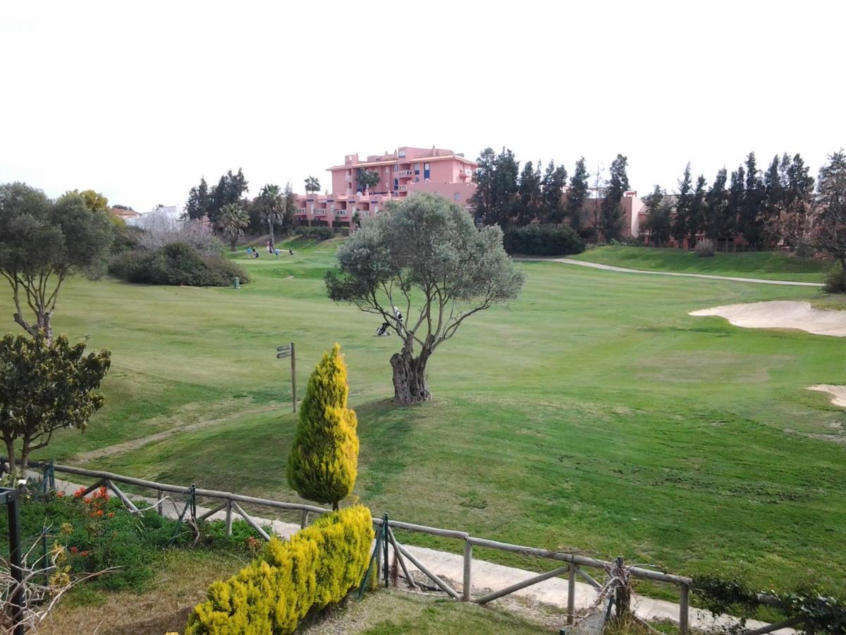 Olhando Um Campo De Golf Islantilla Extérieur photo